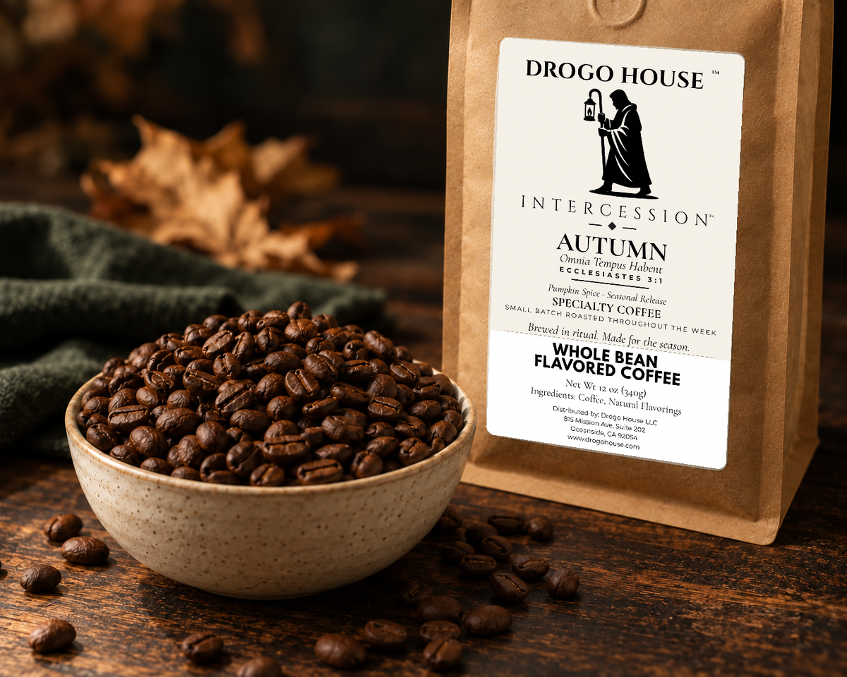 Roasted coffee beans beside a Drogo House Autumn Pumpkin Spice coffee bag