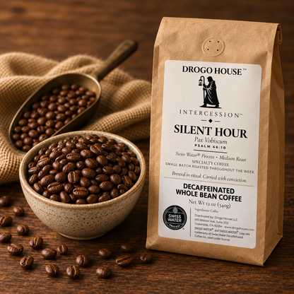 Roasted coffee beans beside a Silent Hour decaf coffee bag